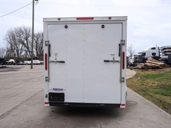 6’x12′ White Enclosed V-Nose Trailer with Diamond Plate Floor Storage - Image 6
