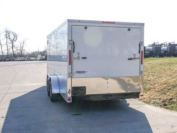 Enclosed Trailer Custom 7’x18′ White Tandem Axle with Ramp and E-Tracks Storage - Image 5
