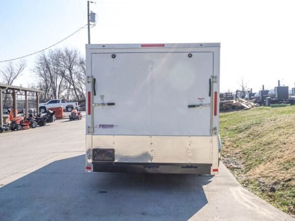 Enclosed Trailer Custom 7’x18′ White Tandem Axle with Ramp and E-Tracks Storage - Image 6